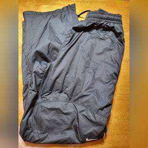 NIKE STORM FIT TRACK PANTS ZIP POCKETS ZIP ANKLES SZ M BLK EXCELLENT CONDITION
